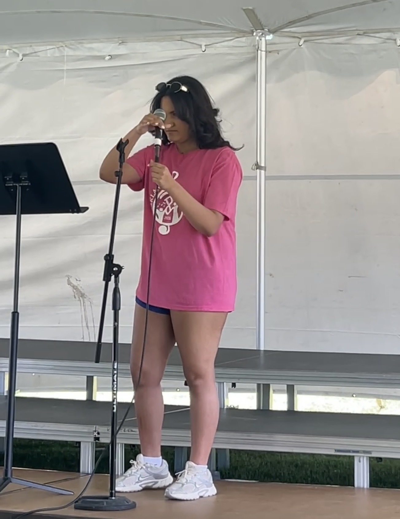Angelina Thompson performing on stage