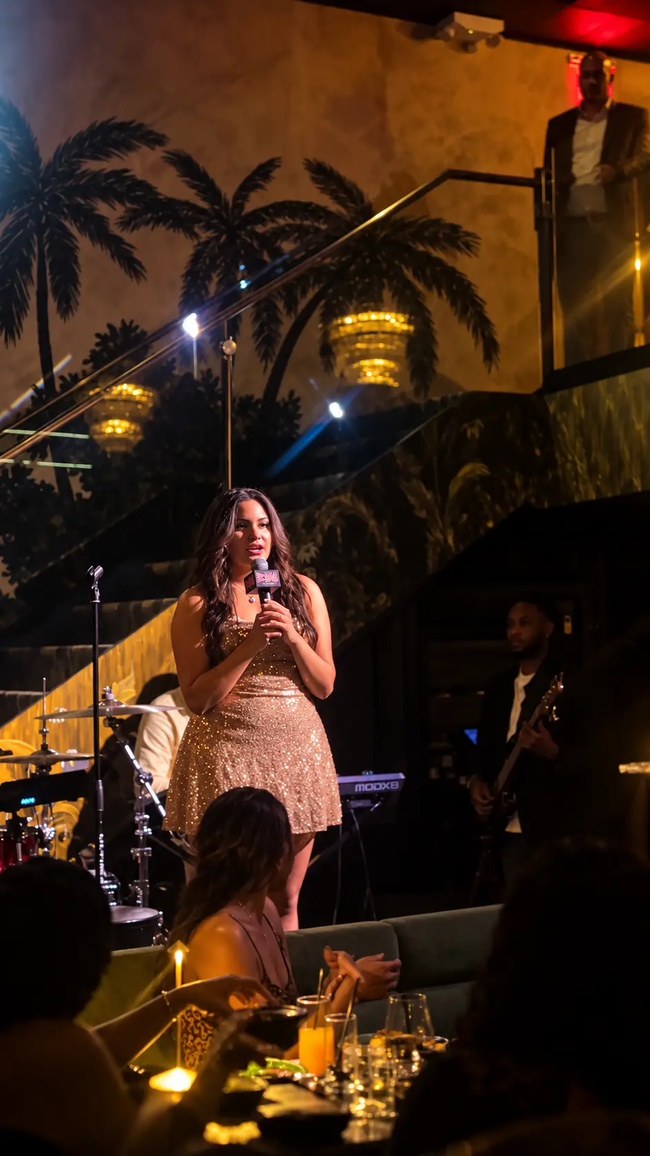 Angelina Thompson performs with the live band at WBLS 107.5 FM’s Mic’s On showcase at LÉLÉ Restaurant in New York City